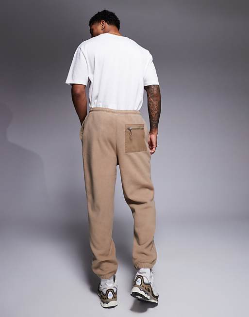 Trousers Asos Design Tapered Fleece In Brown