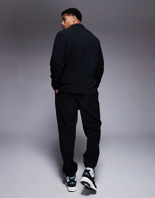 Trousers Asos Design Tapered Fleece In Black