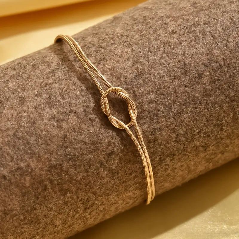 Elegant Copper Knotted Snake Bone Bracelet