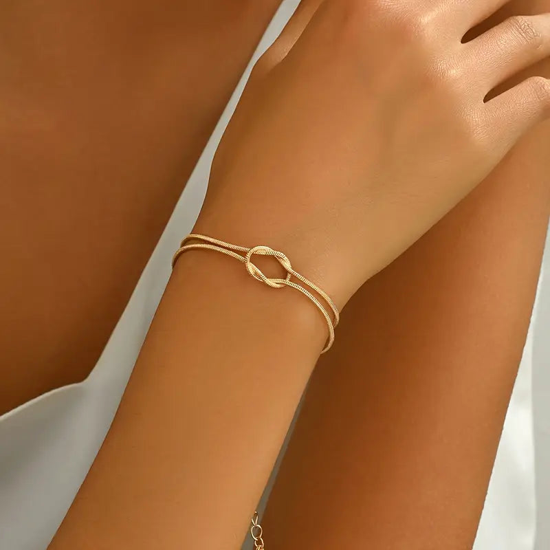 Elegant Copper Knotted Snake Bone Bracelet