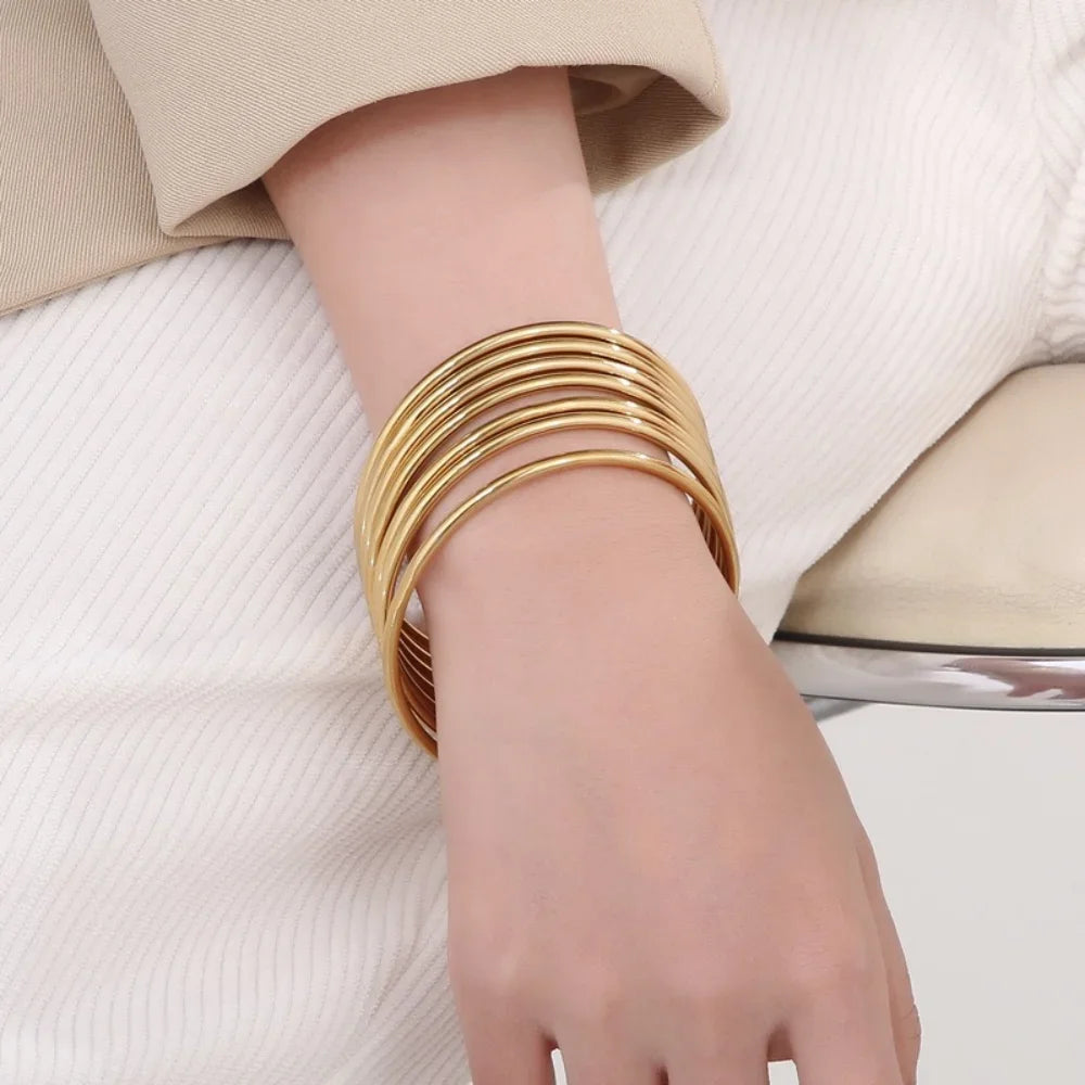 Fashionable Stainless Steel Round Gold Bangle