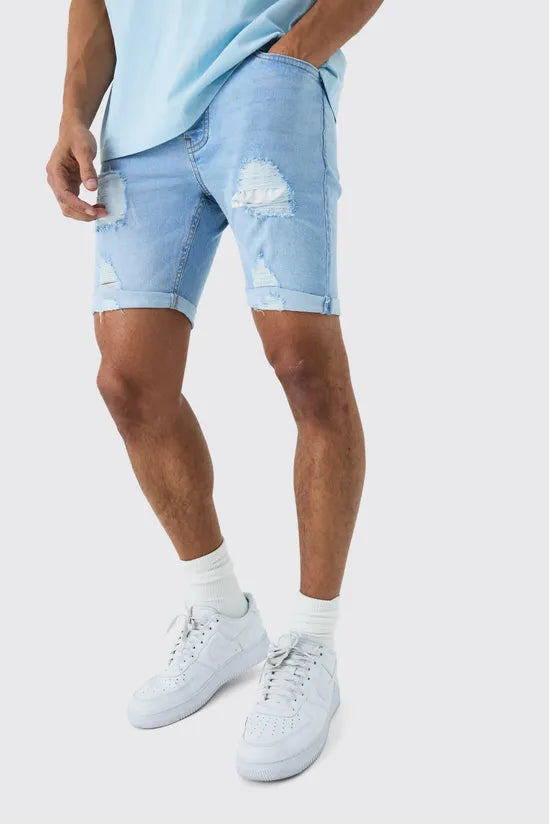 Skinny Stretch Distressed Denim Shorts In Light Blue
