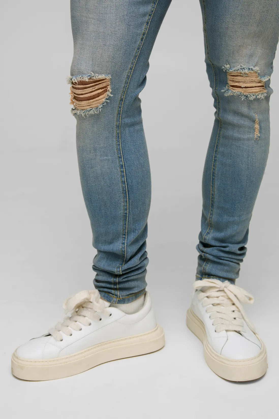 Super Skinny Washed Ripped Knee Jeans