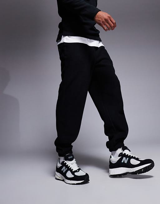 Trousers Asos Design Tapered Fleece In Black