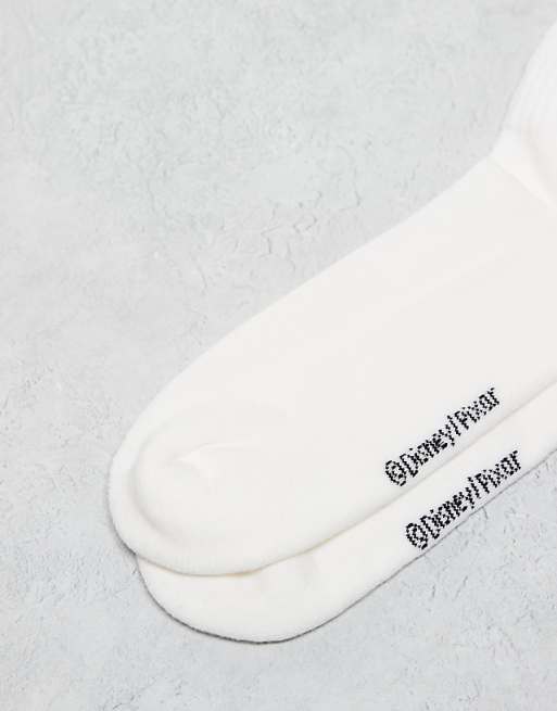Men ASOS DESIGN 2 pack Disney Mater and Mcqueen embroidery socks in white