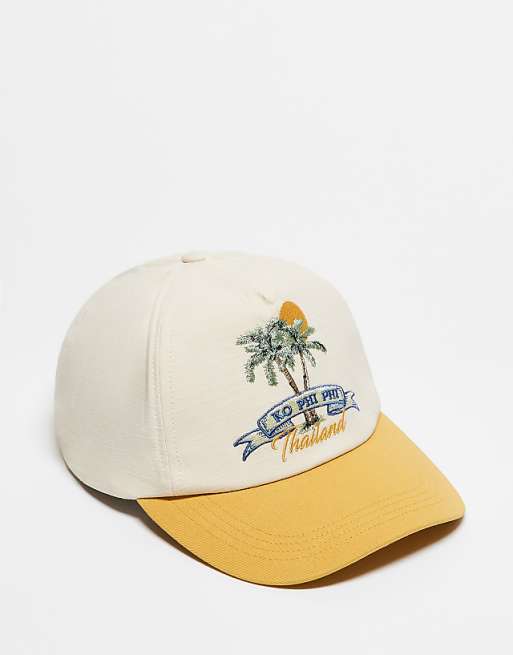 Reclaimed Vintage holiday cap with embroidery in yellow