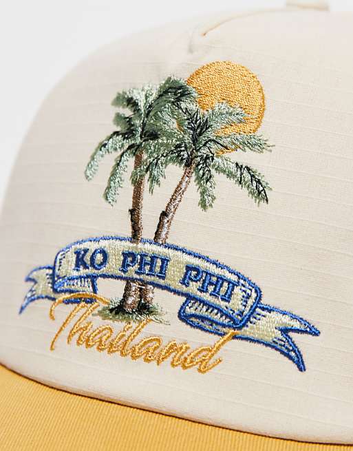 Reclaimed Vintage holiday cap with embroidery in yellow