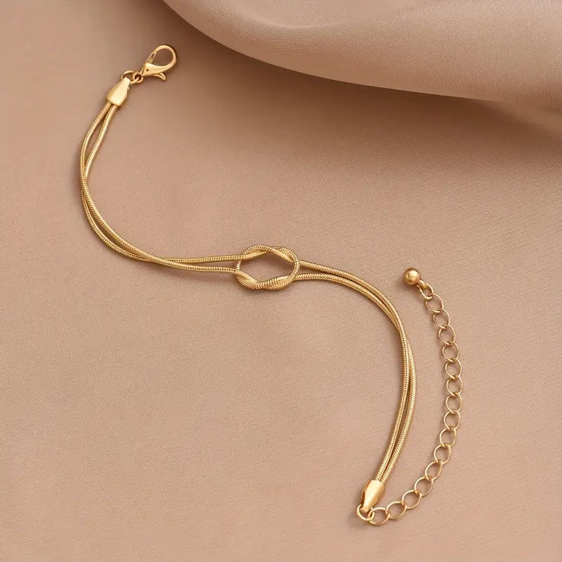 Elegant Copper Knotted Snake Bone Bracelet