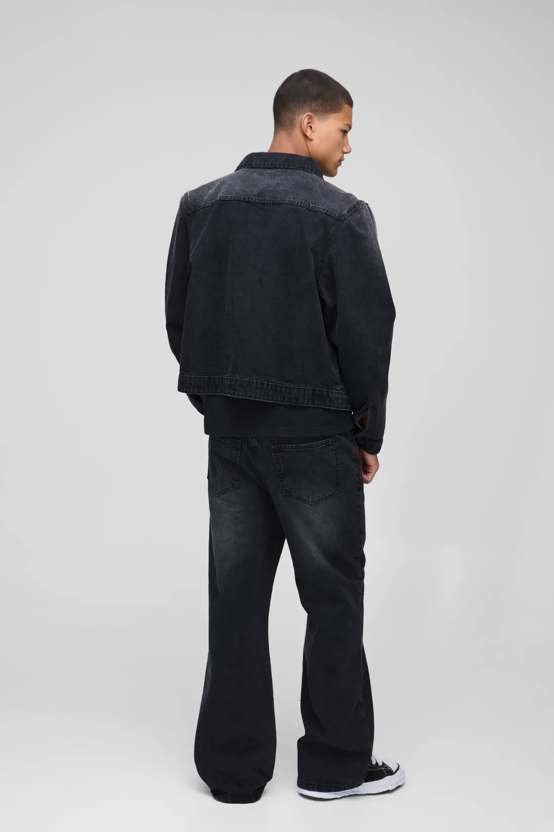 Relaxed Flare Washed Black Ripped Knee Jeans